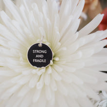 Strong and Fragile pendant